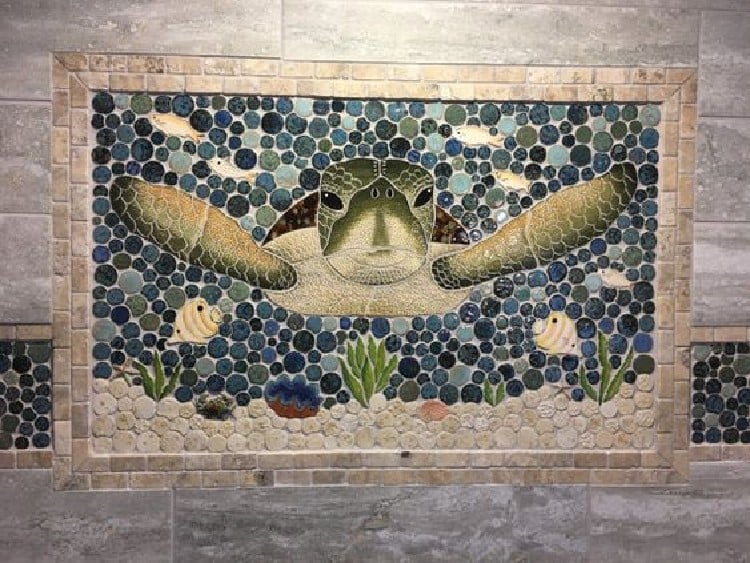 Charming sea turtle mosaic artwork makes a beautiful addition to the bathroom.